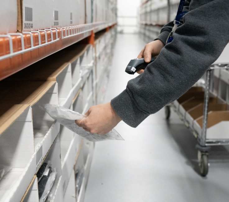 worker scanning product